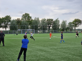 Laatste training S.K.N.W.K. JO11-1JM (partijtje tegen de ouders) van maandag 27 mei 2024 (120/137)